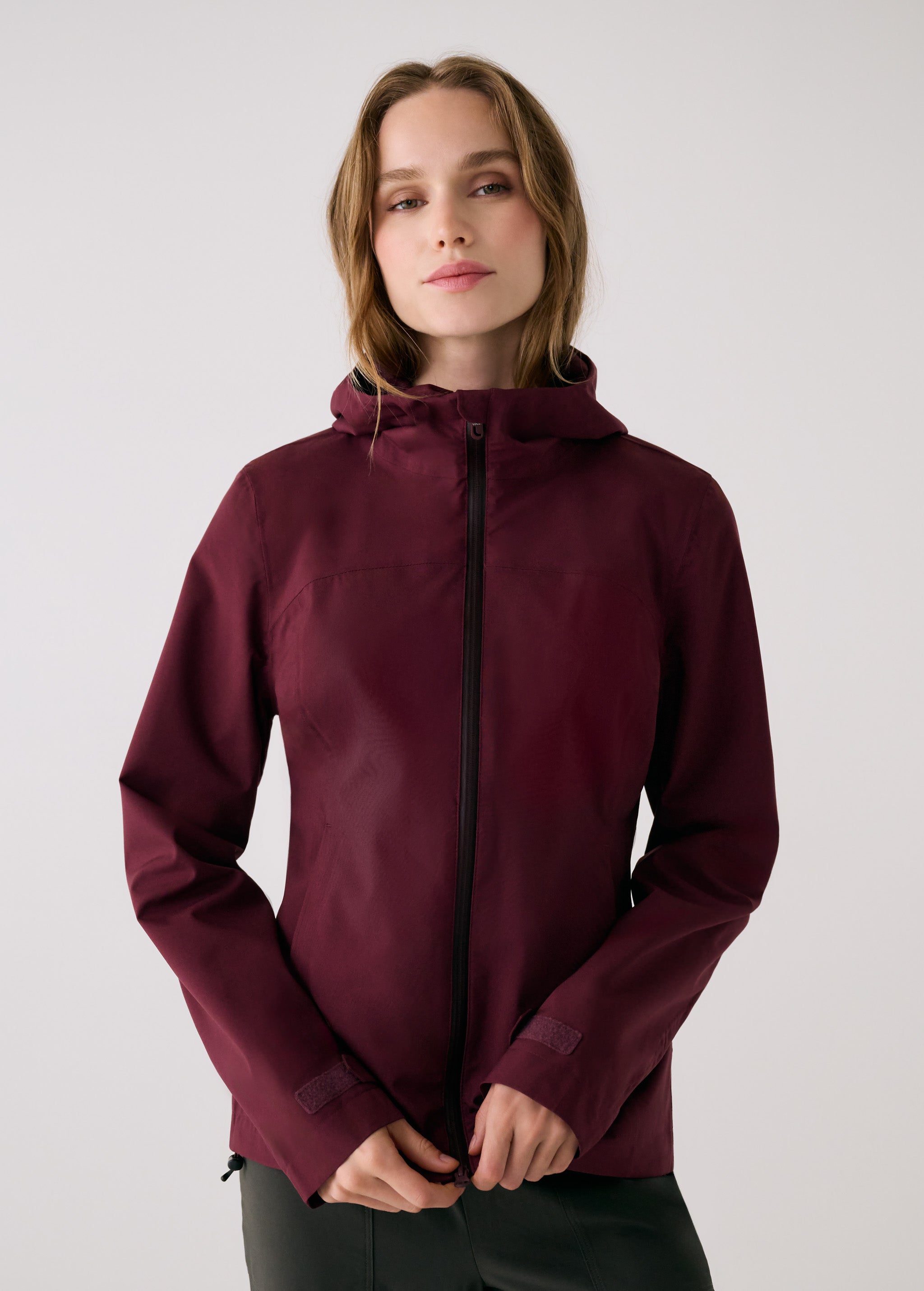 Lolë Element 2 Rain Jacket in burgundy — the Element 2 Rain Jacket is fully seam-sealed to keep moisture out