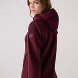 Lolë Element 2 Rain Jacket in burgundy — the Element 2 Rain Jacket is fully seam-sealed to keep moisture out