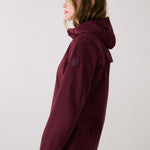 Lolë Element 2 Rain Jacket in burgundy — the Element 2 Rain Jacket is fully seam-sealed to keep moisture out