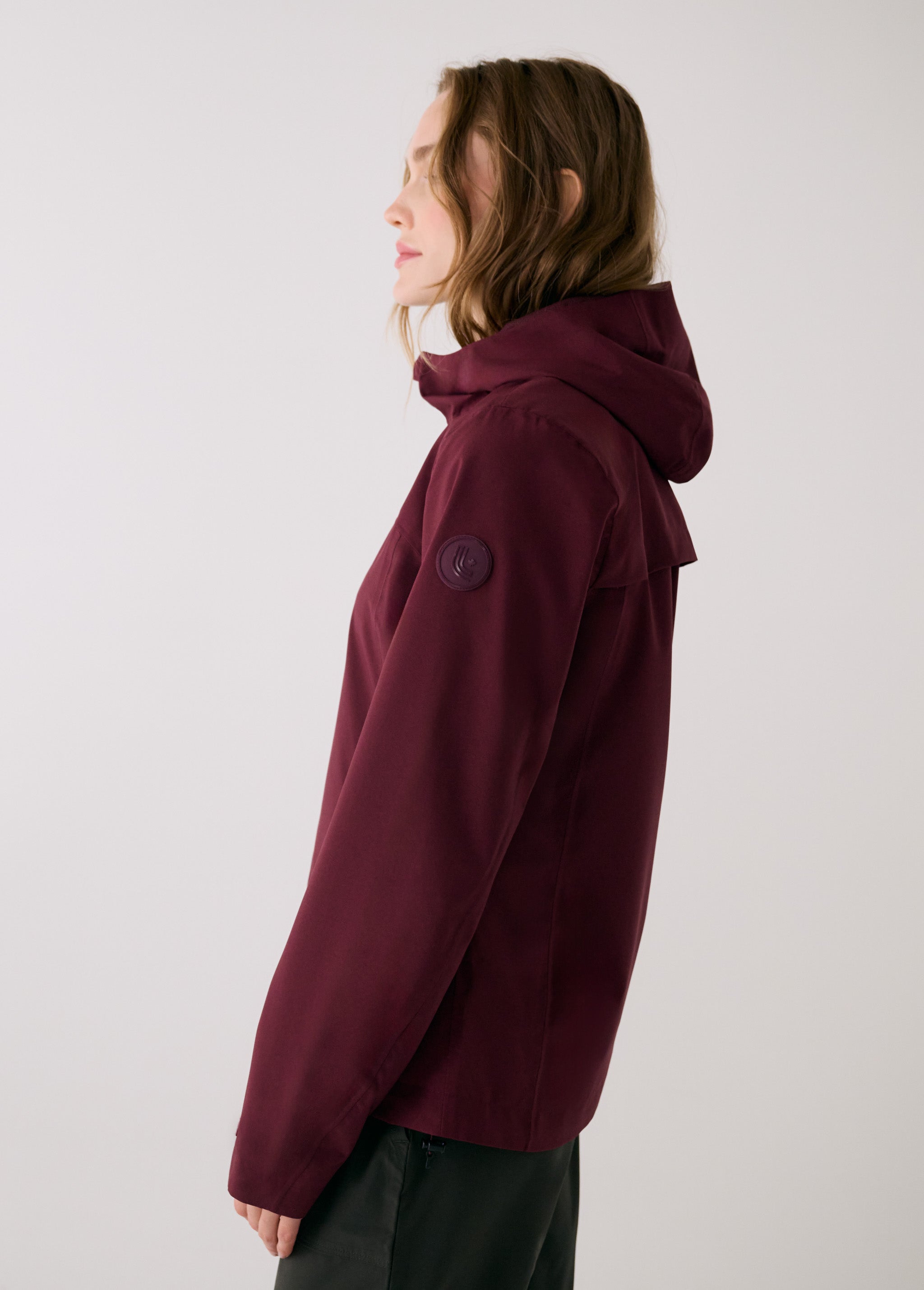 Lolë Element 2 Rain Jacket in burgundy — the Element 2 Rain Jacket is fully seam-sealed to keep moisture out