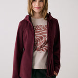 Lolë Element 2 Rain Jacket in burgundy — the Element 2 Rain Jacket is fully seam-sealed to keep moisture out
