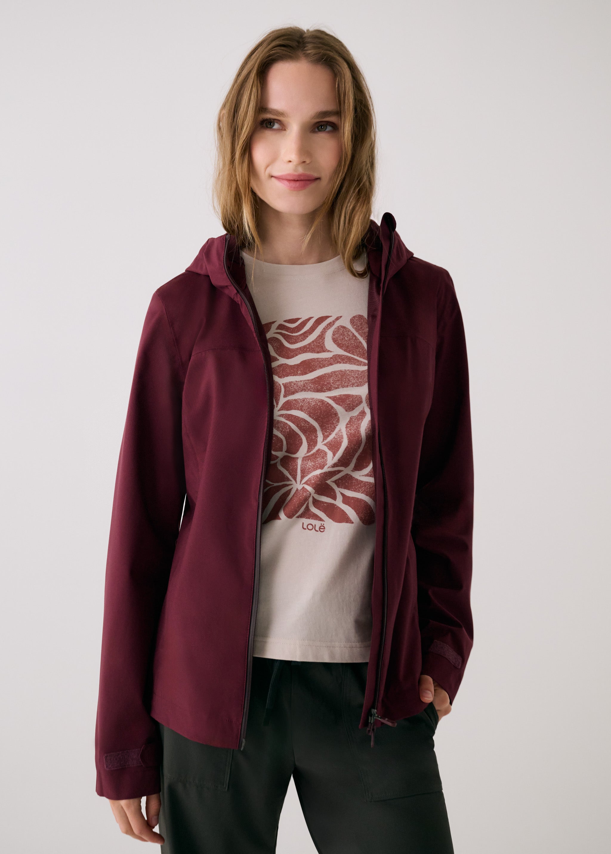 Lolë Element 2 Rain Jacket in burgundy — the Element 2 Rain Jacket is fully seam-sealed to keep moisture out
