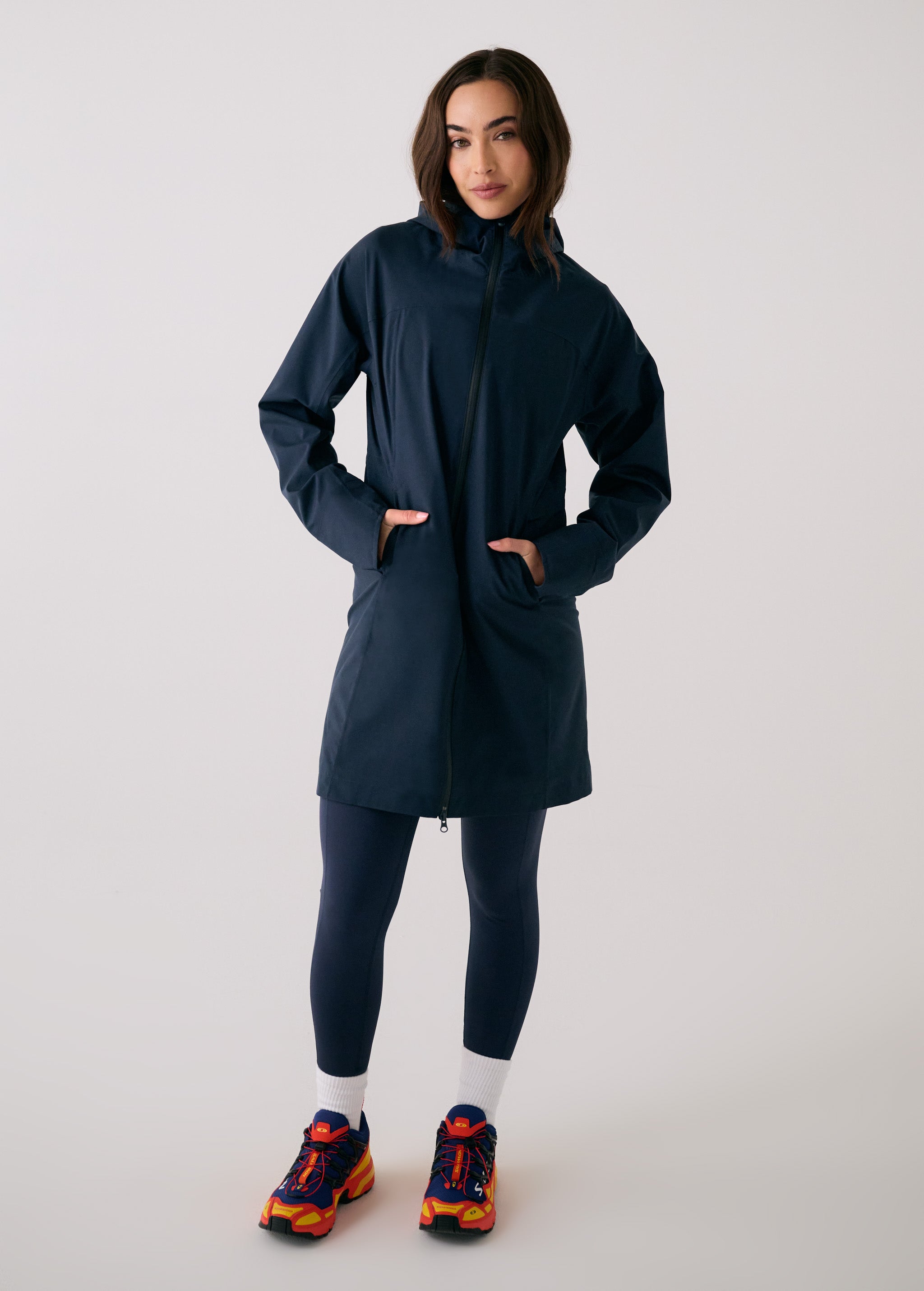 Lolë Element Long Rain Jacket in Outerspace navy — this longline jacket keeps water out while keeping your look sharp