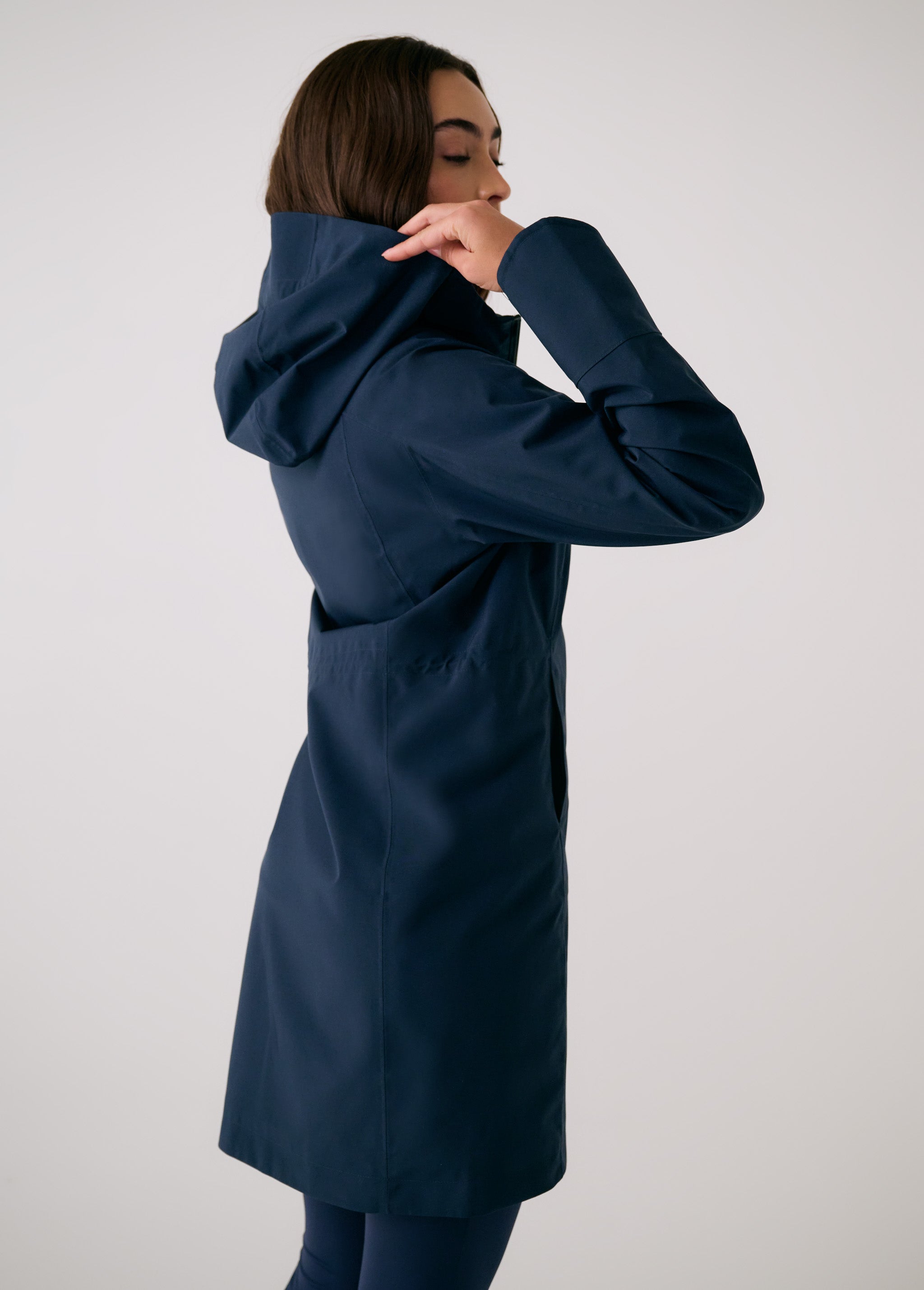 Lolë Element Long Rain Jacket in Outerspace navy — this longline jacket keeps water out while keeping your look sharp