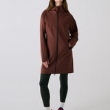 Lolë Element Long Rain Jacket in Sienna brown — this longline jacket keeps water out while keeping your look sharp