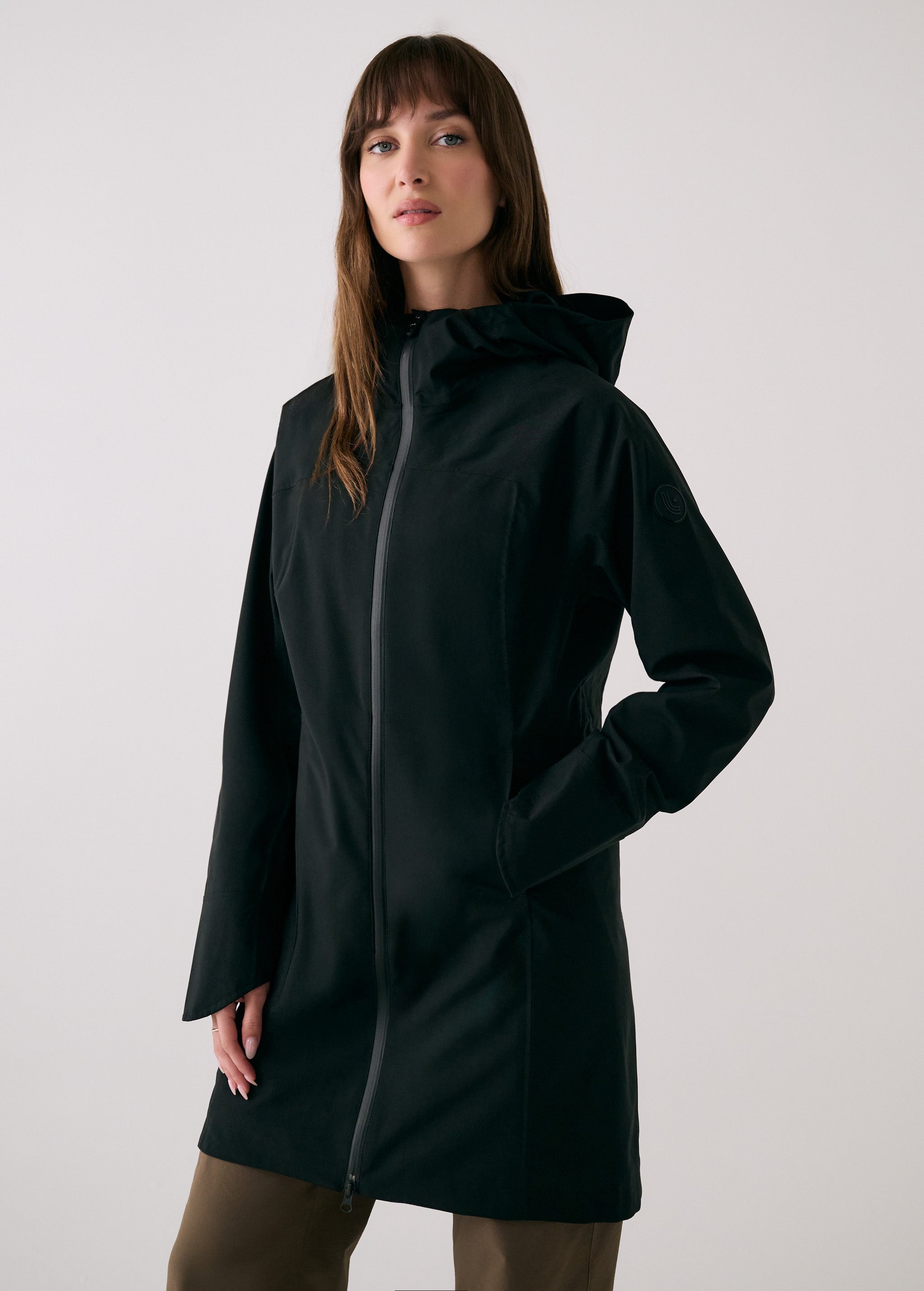Lolë Element Long Rain Jacket in black — this longline jacket keeps water out while keeping your look sharp
