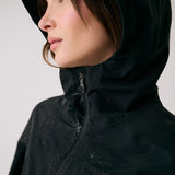 Lolë Element Long Rain Jacket in black — this longline jacket keeps water out while keeping your look sharp