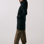 Lolë Element Long Rain Jacket in black — this longline jacket keeps water out while keeping your look sharp