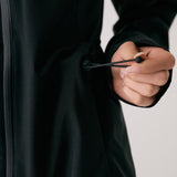 Lolë Element Long Rain Jacket in black — this longline jacket keeps water out while keeping your look sharp