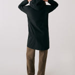 Lolë Element Long Rain Jacket in black — this longline jacket keeps water out while keeping your look sharp
