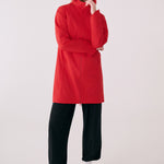 Lolë Element Long Rain Jacket in Poppy red — this longline jacket keeps water out while keeping your look sharp