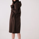 Lolë Alizé Trench Coat in Java dark brown — fit note: Cut with a relaxed fit for comfortable layering