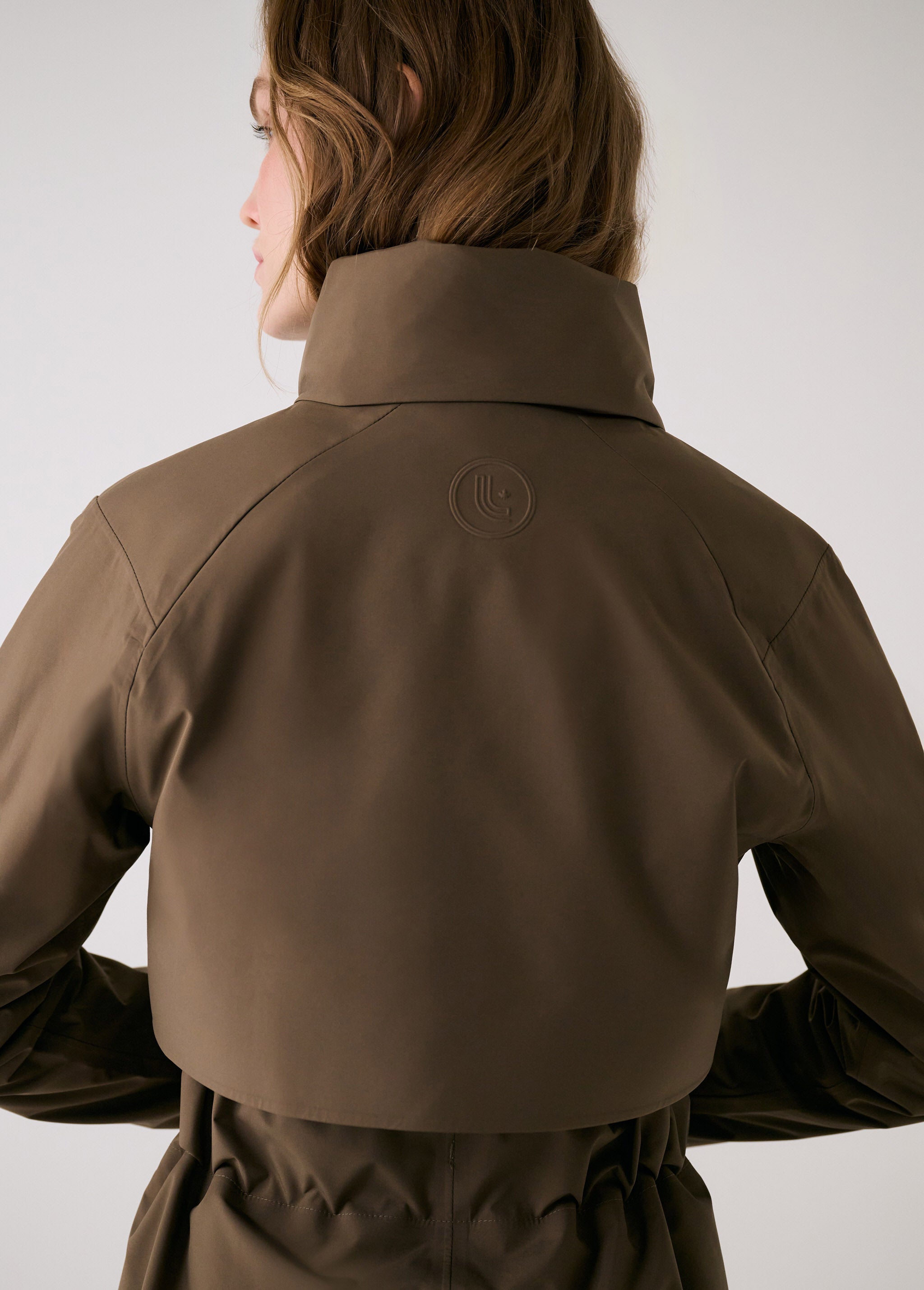 Lolë Alizé Trench Coat in Mocha olive brown — fit note: Cut with a relaxed fit for comfortable layering