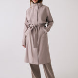 Lolë Alizé Trench Coat in Pebble taupe — fit note: Cut with a relaxed fit for comfortable layering