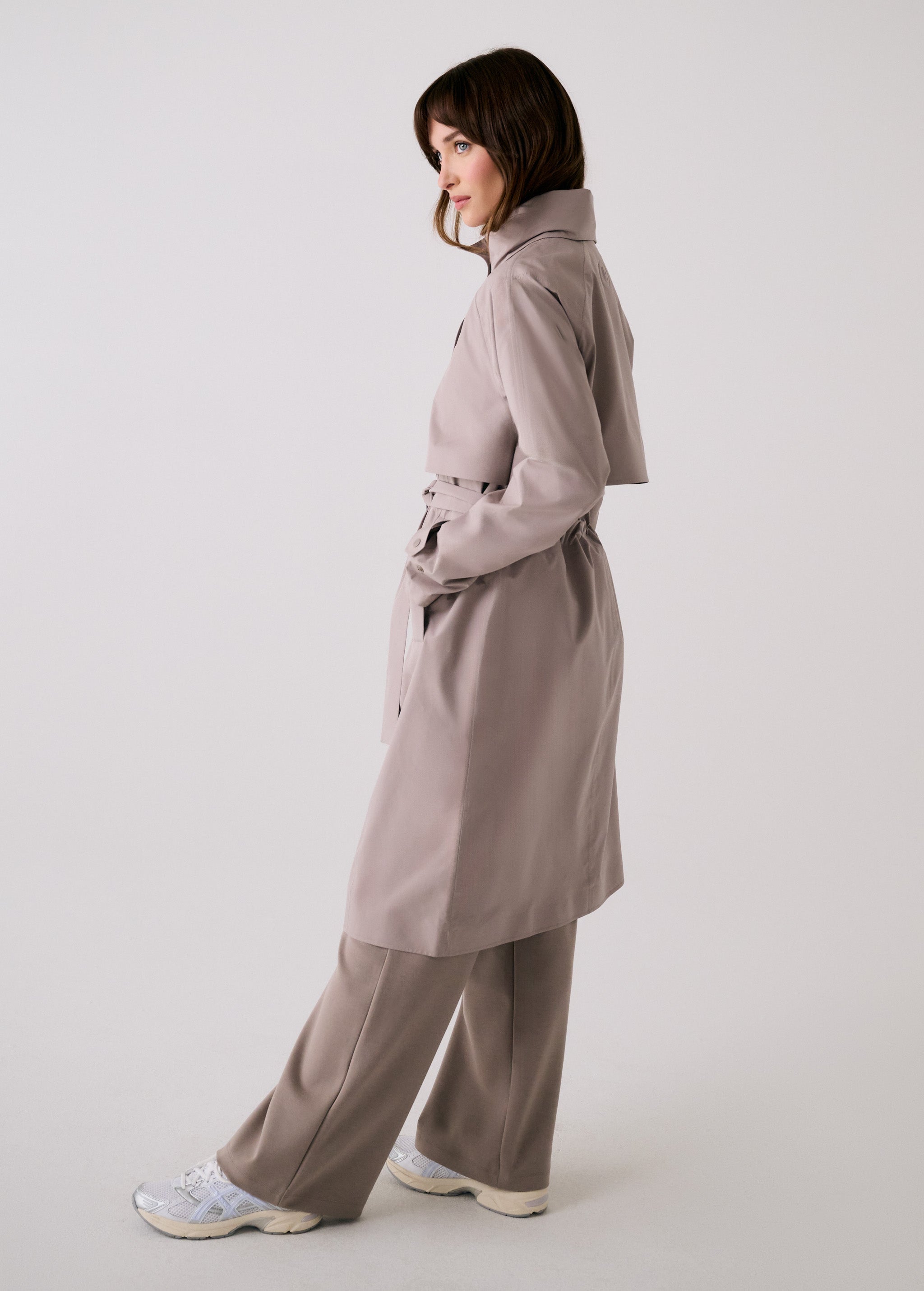 Lolë Alizé Trench Coat in Pebble taupe — fit note: Cut with a relaxed fit for comfortable layering