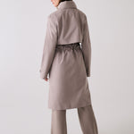 Lolë Alizé Trench Coat in Pebble taupe — fit note: Cut with a relaxed fit for comfortable layering