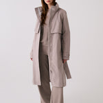 Lolë Alizé Trench Coat in Pebble taupe — fit note: Cut with a relaxed fit for comfortable layering