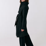 Lolë Alizé Trench Coat in black — fit note: Cut with a relaxed fit for comfortable layering