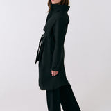 Lolë Alizé Trench Coat in black — fit note: Cut with a relaxed fit for comfortable layering