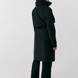 Lolë Alizé Trench Coat in black — fit note: Cut with a relaxed fit for comfortable layering