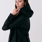 Lolë Alizé Trench Coat in black — fit note: Cut with a relaxed fit for comfortable layering
