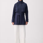 Lolë Alizé Short Trench Coat in Outerspace navy — fit note: Cut with a relaxed fit for comfortable layering