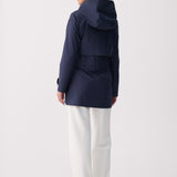 Lolë Alizé Short Trench Coat in Outerspace navy — fit note: Cut with a relaxed fit for comfortable layering