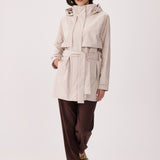 Lolë Alizé Short Trench Coat in Abalone pale greige — fit note: Cut with a relaxed fit for comfortable layering