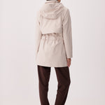 Lolë Alizé Short Trench Coat in Abalone pale greige — fit note: Cut with a relaxed fit for comfortable layering