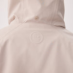 Lolë Alizé Short Trench Coat in Abalone pale greige — fit note: Cut with a relaxed fit for comfortable layering