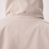 Lolë Alizé Short Trench Coat in Abalone pale greige — fit note: Cut with a relaxed fit for comfortable layering