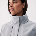 Lolë Alizé Short Trench Coat in Steel light grey — fit note: Cut with a relaxed fit for comfortable layering