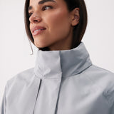 Lolë Alizé Short Trench Coat in Steel light grey — fit note: Cut with a relaxed fit for comfortable layering