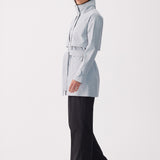 Lolë Alizé Short Trench Coat in Steel light grey — fit note: Cut with a relaxed fit for comfortable layering