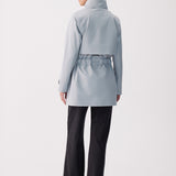 Lolë Alizé Short Trench Coat in Steel light grey — fit note: Cut with a relaxed fit for comfortable layering