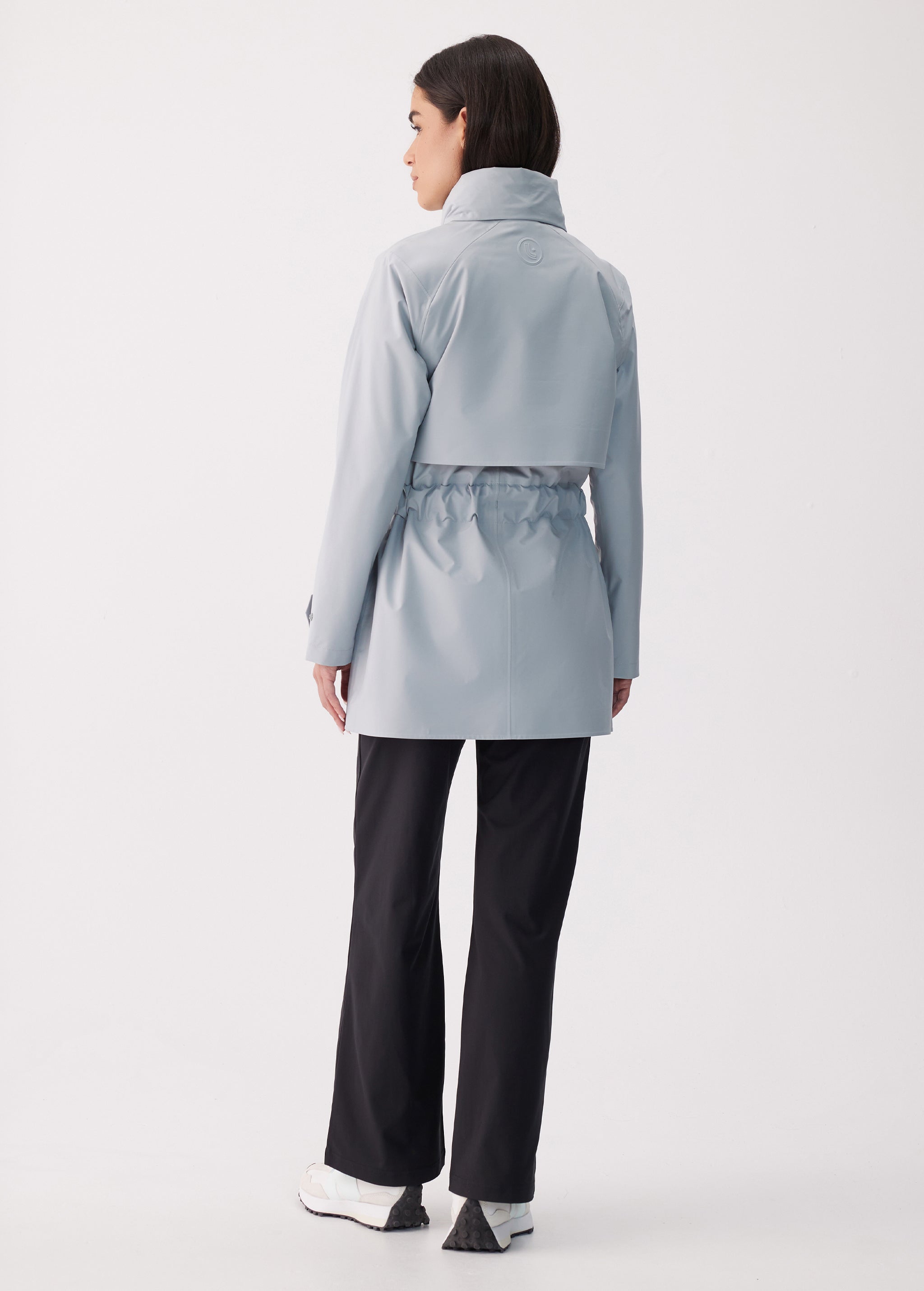 Lolë Alizé Short Trench Coat in Steel light grey — fit note: Cut with a relaxed fit for comfortable layering
