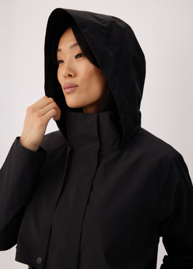 Lolë Alizé Short Trench Coat in black — fit note: Cut with a relaxed fit for comfortable layering
