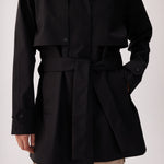 Lolë Alizé Short Trench Coat in black — fit note: Cut with a relaxed fit for comfortable layering