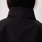 Lolë Alizé Short Trench Coat in black — fit note: Cut with a relaxed fit for comfortable layering