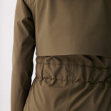 Lolë Alizé Short Trench Coat in Moss olive green — fit note: Cut with a relaxed fit for comfortable layering