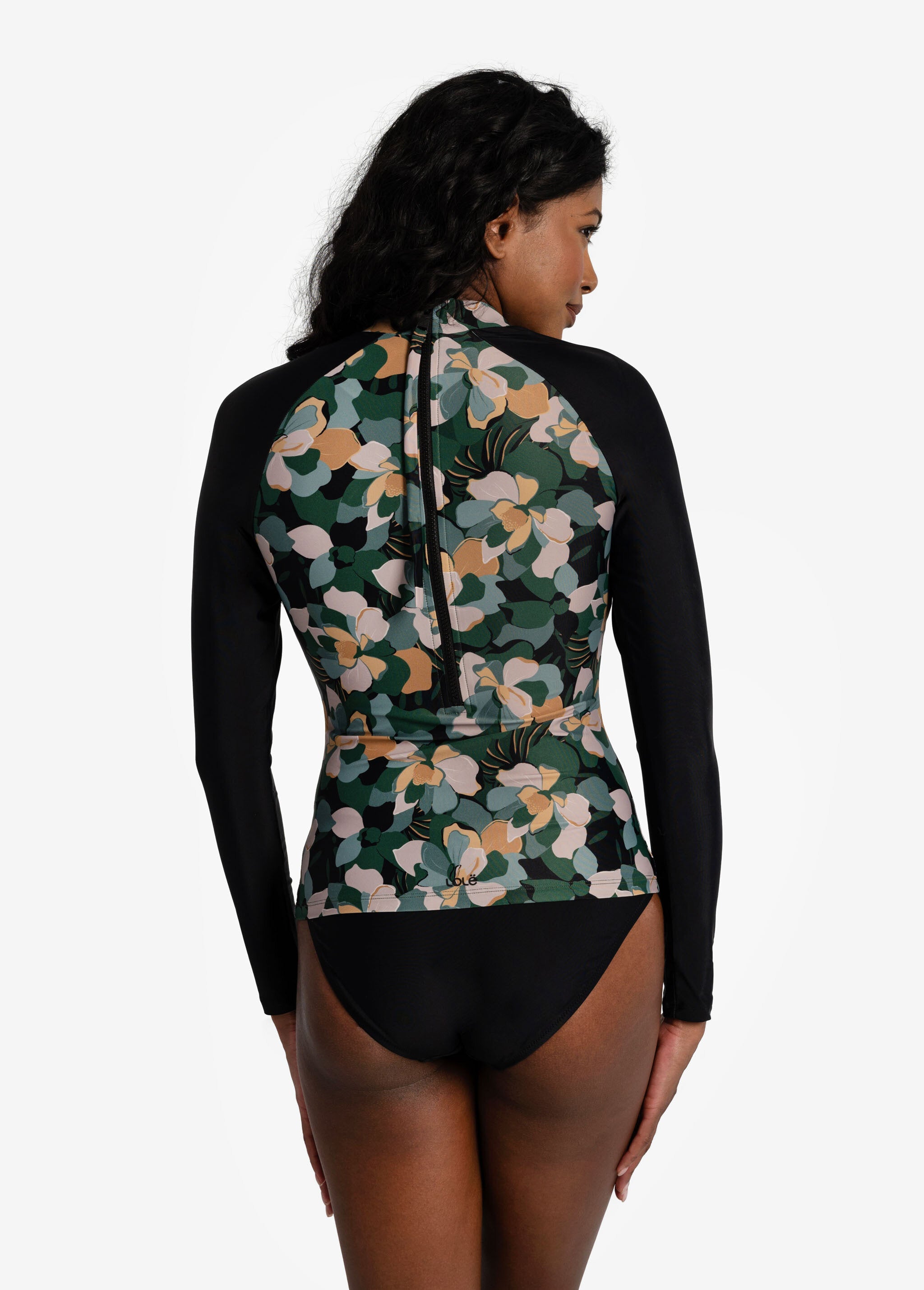 Lolë Seychelles Rashguard in blue — this fitted long-sleeve top gives you lightweight sun protection