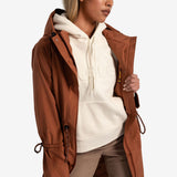 Lolë Piper Oversized Rain Jacket in rust — for a more streamlined fit, consider sizing down