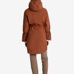 Lolë Piper Oversized Rain Jacket in rust — for a more streamlined fit, consider sizing down