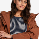 Lolë Piper Oversized Rain Jacket in rust — for a more streamlined fit, consider sizing down