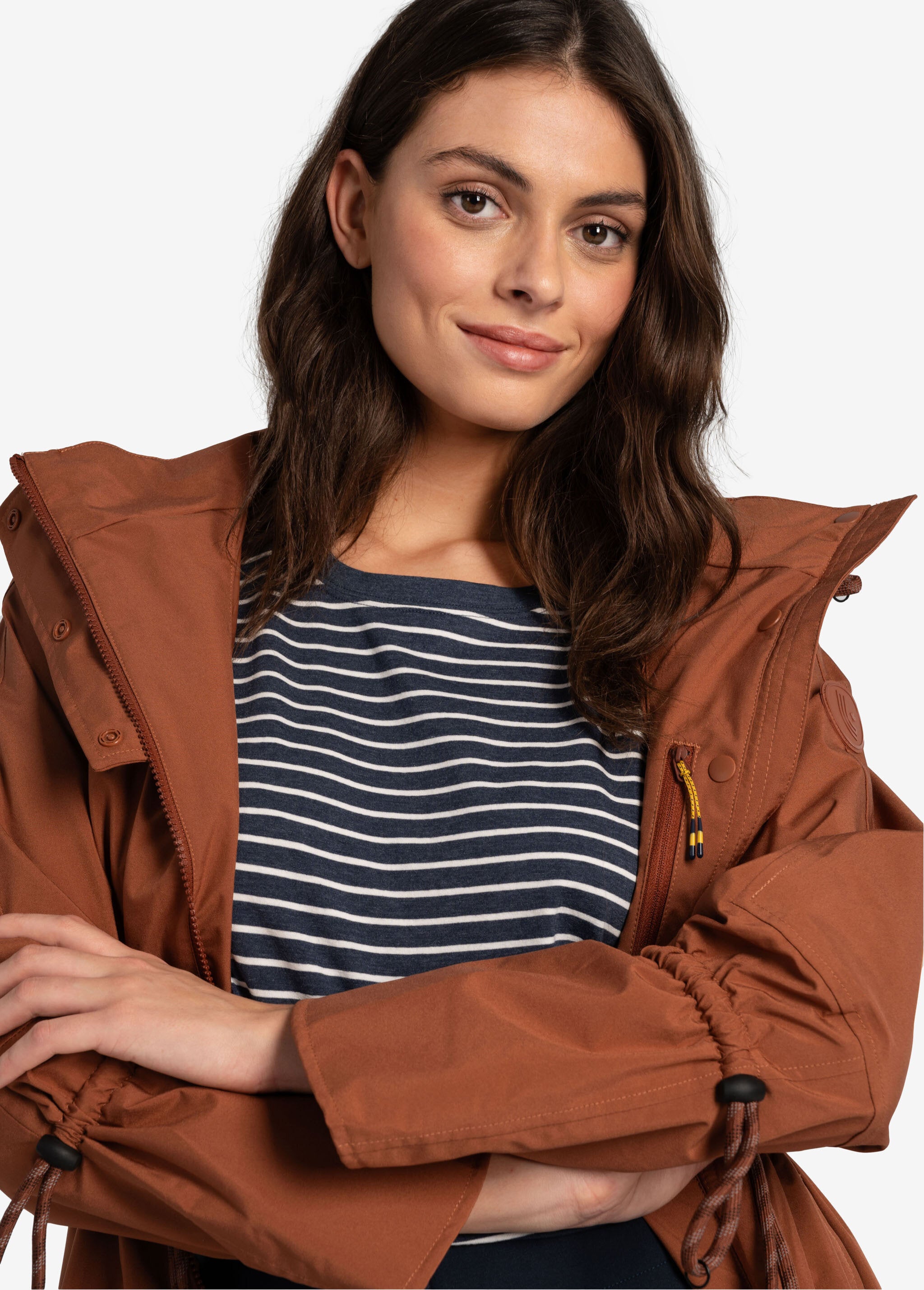 Lolë Piper Oversized Rain Jacket in rust — for a more streamlined fit, consider sizing down