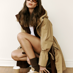 Lolë Piper Oversized Rain Jacket in Carmel tan — for a more streamlined fit, consider sizing down