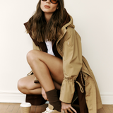 Lolë Piper Oversized Rain Jacket in Carmel tan — for a more streamlined fit, consider sizing down