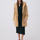 Lolë Piper Oversized Rain Jacket in Carmel tan — for a more streamlined fit, consider sizing down