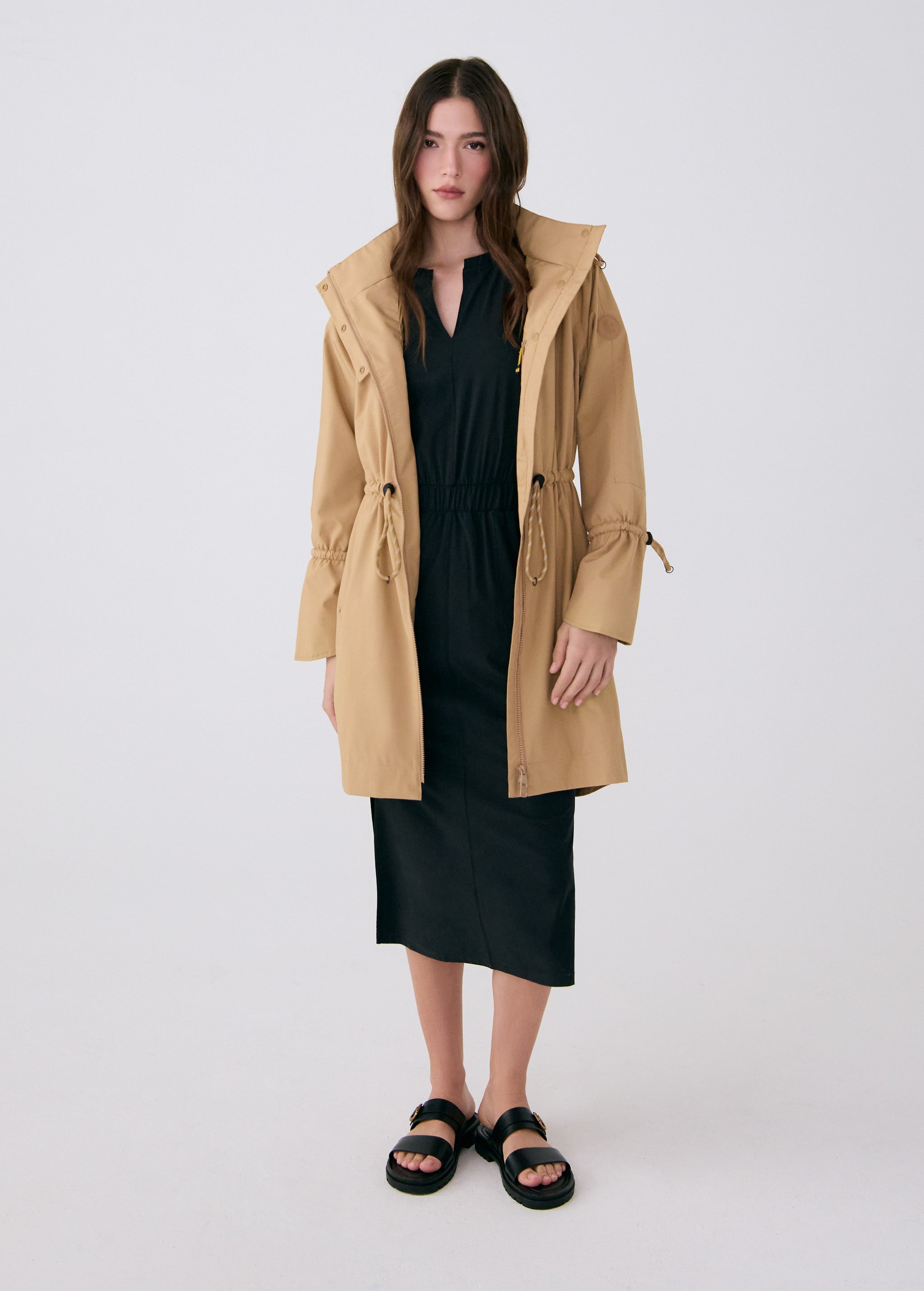 Lolë Piper Oversized Rain Jacket in Carmel tan — for a more streamlined fit, consider sizing down