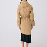Lolë Piper Oversized Rain Jacket in Carmel tan — for a more streamlined fit, consider sizing down